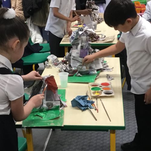 Painting our paper mache volcanoes we built last week! 